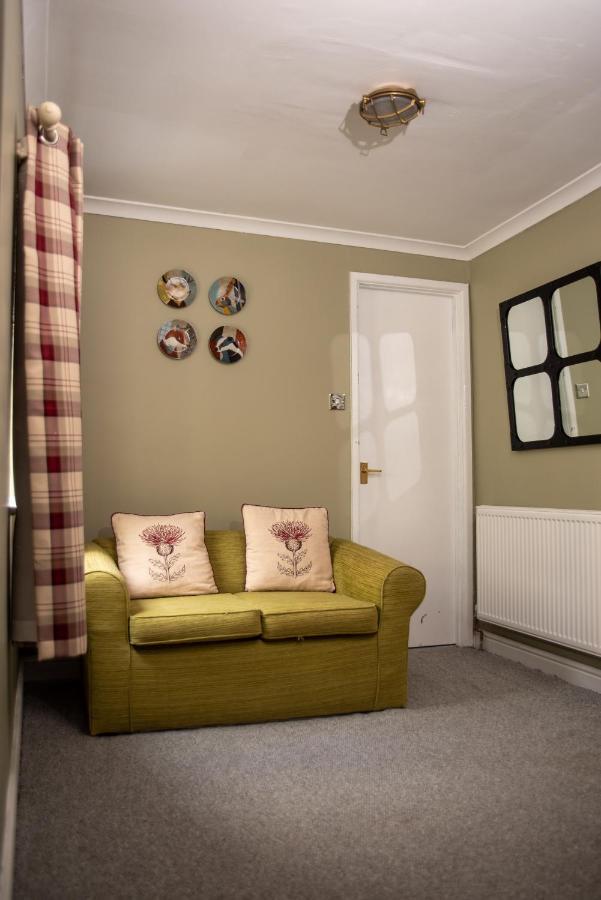 The Oak House Hotel Axbridge Eksteriør billede A room with a radiator